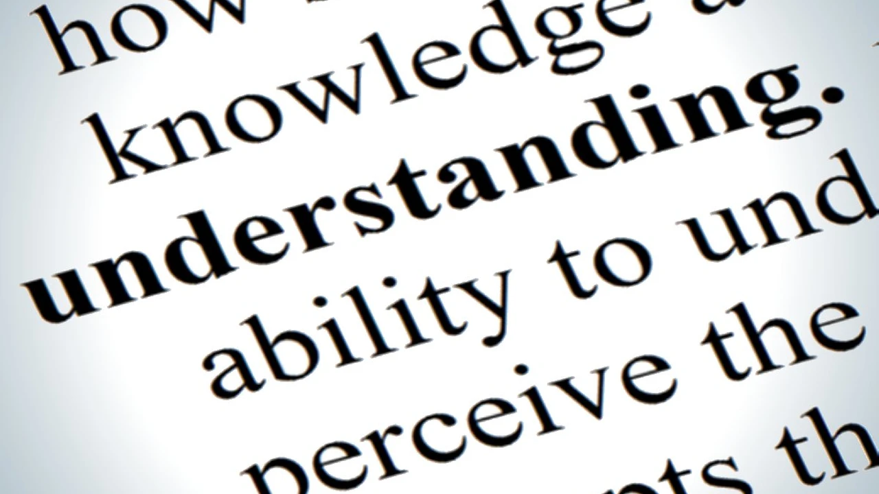 overhead view of corned beef sliced and on a platter with cabbage, potatoes, and carrots